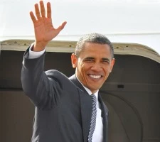 President Obama waving to a crowd prior to boarding Air Force One